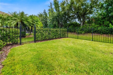 Tucked away at the end of a serene cul-de-sac in the prestigious on University Park Country Club in Florida - for sale on GolfHomes.com, golf home, golf lot