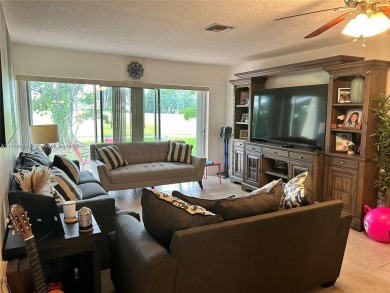 This elegantly updated villa features two bedrooms and two on Colony West Country Club in Florida - for sale on GolfHomes.com, golf home, golf lot