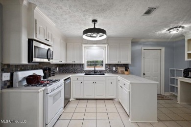 This charming 3-bedroom, 2-bath home, nestled in the heart of on Pearl Municipal Golf Course in Mississippi - for sale on GolfHomes.com, golf home, golf lot