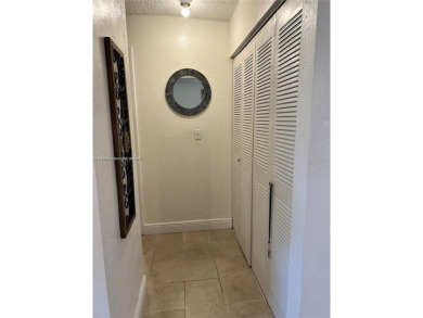 This elegantly updated villa features two bedrooms and two on Colony West Country Club in Florida - for sale on GolfHomes.com, golf home, golf lot