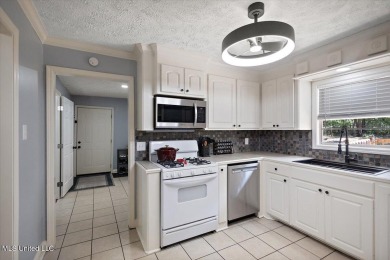 This charming 3-bedroom, 2-bath home, nestled in the heart of on Pearl Municipal Golf Course in Mississippi - for sale on GolfHomes.com, golf home, golf lot
