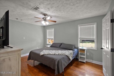 This charming 3-bedroom, 2-bath home, nestled in the heart of on Pearl Municipal Golf Course in Mississippi - for sale on GolfHomes.com, golf home, golf lot