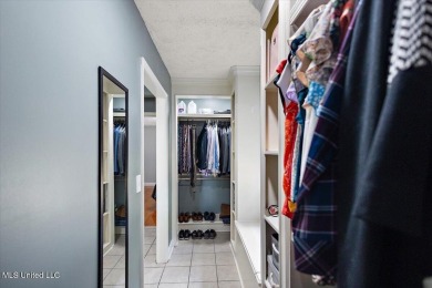 This charming 3-bedroom, 2-bath home, nestled in the heart of on Pearl Municipal Golf Course in Mississippi - for sale on GolfHomes.com, golf home, golf lot