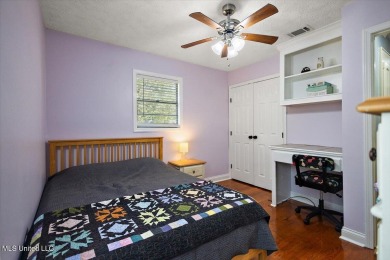 This charming 3-bedroom, 2-bath home, nestled in the heart of on Pearl Municipal Golf Course in Mississippi - for sale on GolfHomes.com, golf home, golf lot