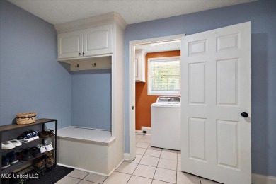 This charming 3-bedroom, 2-bath home, nestled in the heart of on Pearl Municipal Golf Course in Mississippi - for sale on GolfHomes.com, golf home, golf lot
