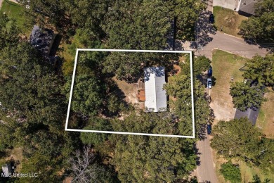 This charming 3-bedroom, 2-bath home, nestled in the heart of on Pearl Municipal Golf Course in Mississippi - for sale on GolfHomes.com, golf home, golf lot
