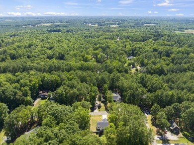 Welcome to your dream home in the prestigious gated community of on River Golf and County Club at Lake Royale in North Carolina - for sale on GolfHomes.com, golf home, golf lot