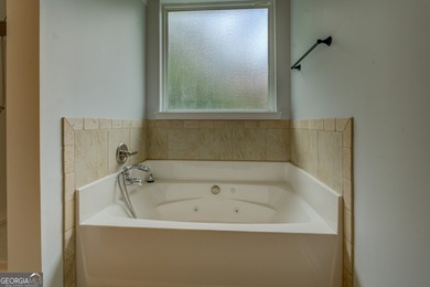 Perfect, step-less ranch home in popular Covington Place on Indian Creek Golf Club in Georgia - for sale on GolfHomes.com, golf home, golf lot