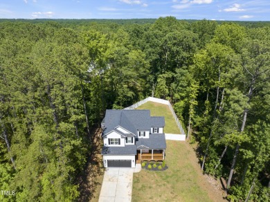 Welcome to your dream home in the prestigious gated community of on River Golf and County Club at Lake Royale in North Carolina - for sale on GolfHomes.com, golf home, golf lot