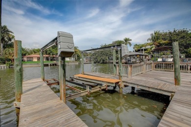 This fabulous WATERFRONT home is located in highly desirable on Rocky Point Golf Course in Florida - for sale on GolfHomes.com, golf home, golf lot