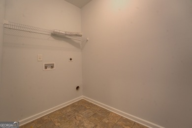 Perfect, step-less ranch home in popular Covington Place on Indian Creek Golf Club in Georgia - for sale on GolfHomes.com, golf home, golf lot