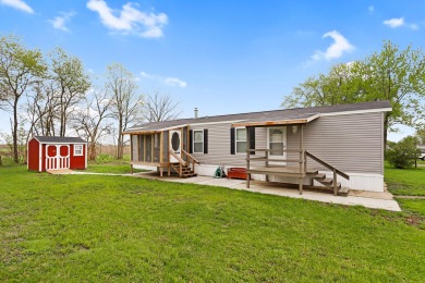 2 year new mobile home that has been lived in for less than a on Lake of the Woods Golf Course in Illinois - for sale on GolfHomes.com, golf home, golf lot