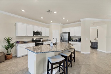 Panoramic lake views in a premier Venice golf community! on Sarasota National Golf Club in Florida - for sale on GolfHomes.com, golf home, golf lot