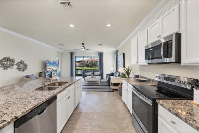Panoramic lake views in a premier Venice golf community! on Sarasota National Golf Club in Florida - for sale on GolfHomes.com, golf home, golf lot