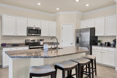 Panoramic lake views in a premier Venice golf community! on Sarasota National Golf Club in Florida - for sale on GolfHomes.com, golf home, golf lot