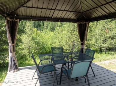 100 feet of Lamb Creek frontage in a peaceful, private setting on Priest Lake Golf and Tennis Club in Idaho - for sale on GolfHomes.com, golf home, golf lot