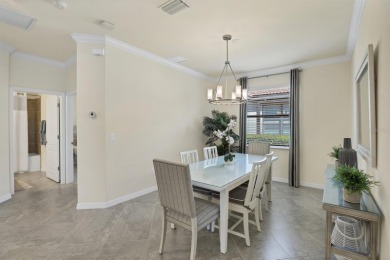 Panoramic lake views in a premier Venice golf community! on Sarasota National Golf Club in Florida - for sale on GolfHomes.com, golf home, golf lot