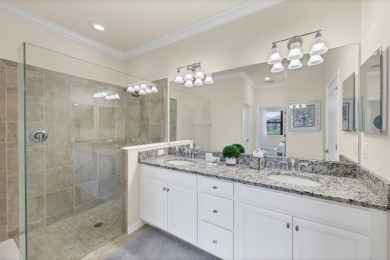 Panoramic lake views in a premier Venice golf community! on Sarasota National Golf Club in Florida - for sale on GolfHomes.com, golf home, golf lot