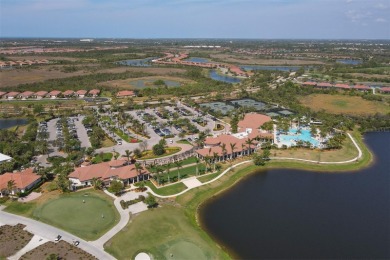 Panoramic lake views in a premier Venice golf community! on Sarasota National Golf Club in Florida - for sale on GolfHomes.com, golf home, golf lot