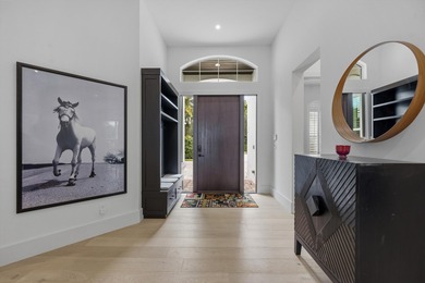 Stunning fully renovated residence located in the highly sought on Palm Beach Polo and Country Club in Florida - for sale on GolfHomes.com, golf home, golf lot