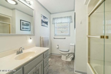 Appealing brick rancher with many new updates located in on Emory Golf and Country Club in Tennessee - for sale on GolfHomes.com, golf home, golf lot