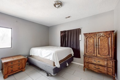 This 2-bedroom, 2-bathroom home features an open-concept layout on Los Altos Golf Course in New Mexico - for sale on GolfHomes.com, golf home, golf lot