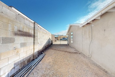 This 2-bedroom, 2-bathroom home features an open-concept layout on Los Altos Golf Course in New Mexico - for sale on GolfHomes.com, golf home, golf lot