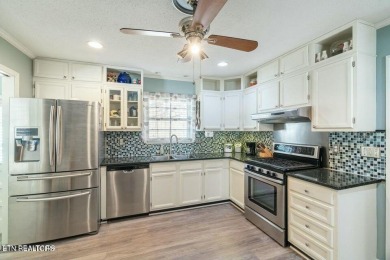 Appealing brick rancher with many new updates located in on Emory Golf and Country Club in Tennessee - for sale on GolfHomes.com, golf home, golf lot