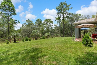 Modern Elegance Meets Outdoor Beauty - 2023 Contemporary 4/2 in on Pine Ridge Community Golf and Country Club in Florida - for sale on GolfHomes.com, golf home, golf lot