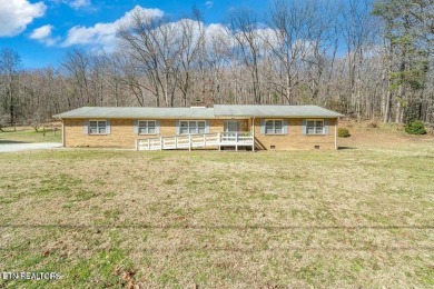 Appealing brick rancher with many new updates located in on Emory Golf and Country Club in Tennessee - for sale on GolfHomes.com, golf home, golf lot