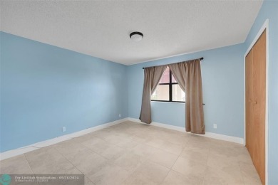 55+ COMMUNITY, THIS BEAUTIFUL TURN KEY READY UNIT IS ON THE 3rd on Sunrise Lakes Phase IV Golf Course in Florida - for sale on GolfHomes.com, golf home, golf lot