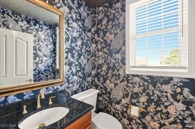 Welcome home to this beautifully updated brick colonial located on Gleneagles Golf Club in Ohio - for sale on GolfHomes.com, golf home, golf lot