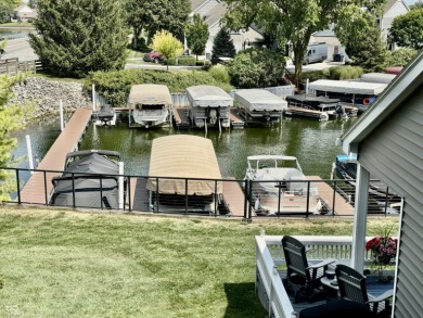 Single level (upper) 3 bedroom Waterscape unit w/ dock on Harbour Trees Golf Club in Indiana - for sale on GolfHomes.com, golf home, golf lot