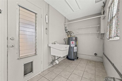 Welcome to the highly sought-after Mainlands of Tamarac (Unit 3) on Mainlands Golf Club in Florida - for sale on GolfHomes.com, golf home, golf lot