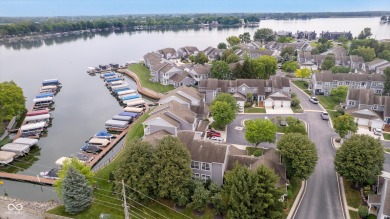 Single level (upper) 3 bedroom Waterscape unit w/ dock on Harbour Trees Golf Club in Indiana - for sale on GolfHomes.com, golf home, golf lot