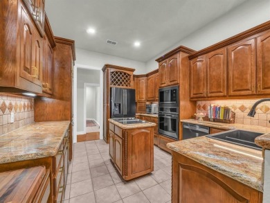 Welcome to this beautifully updated, custom-built single-story on Pecan Plantation Country Club in Texas - for sale on GolfHomes.com, golf home, golf lot
