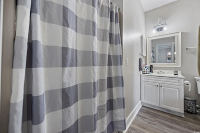 Turnkey income-producing beauty! This stunning 2-bedroom, 2-bath on Myrtlewood Golf Course and Club  in South Carolina - for sale on GolfHomes.com, golf home, golf lot