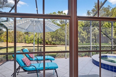 This beautifully maintained home offers exceptional privacy on Ritz-Carlton Members Golf Club in Florida - for sale on GolfHomes.com, golf home, golf lot