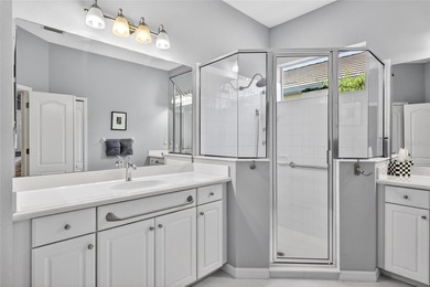 This beautifully maintained home offers exceptional privacy on Ritz-Carlton Members Golf Club in Florida - for sale on GolfHomes.com, golf home, golf lot