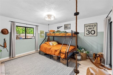 Bright, spacious townhouse in the San Carlos Park area with on Estero Country Club in Florida - for sale on GolfHomes.com, golf home, golf lot