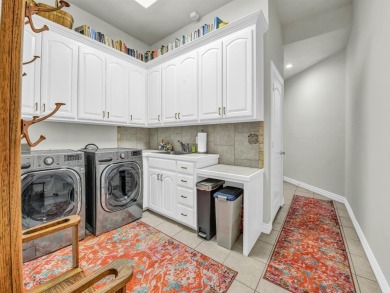 Welcome to this beautifully updated, custom-built single-story on Pecan Plantation Country Club in Texas - for sale on GolfHomes.com, golf home, golf lot