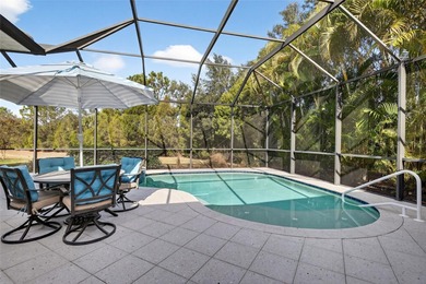 This beautifully maintained home offers exceptional privacy on Ritz-Carlton Members Golf Club in Florida - for sale on GolfHomes.com, golf home, golf lot