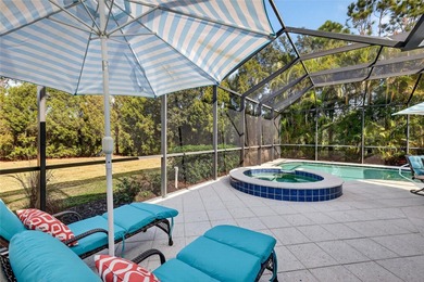 This beautifully maintained home offers exceptional privacy on Ritz-Carlton Members Golf Club in Florida - for sale on GolfHomes.com, golf home, golf lot