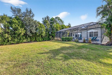 This beautifully maintained home offers exceptional privacy on Ritz-Carlton Members Golf Club in Florida - for sale on GolfHomes.com, golf home, golf lot