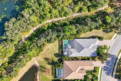 This beautifully maintained home offers exceptional privacy on Ritz-Carlton Members Golf Club in Florida - for sale on GolfHomes.com, golf home, golf lot