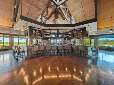 This beautifully maintained home offers exceptional privacy on Ritz-Carlton Members Golf Club in Florida - for sale on GolfHomes.com, golf home, golf lot