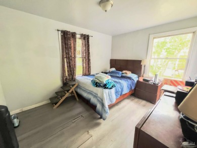 This quaint country cottage-style gem offers the perfect canvas on Champion Golf Club in Florida - for sale on GolfHomes.com, golf home, golf lot