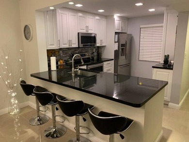 INVESTOR OPPORTUNITY: Fully Furnished with Creditable Tenant on Inverrary Country Club in Florida - for sale on GolfHomes.com, golf home, golf lot