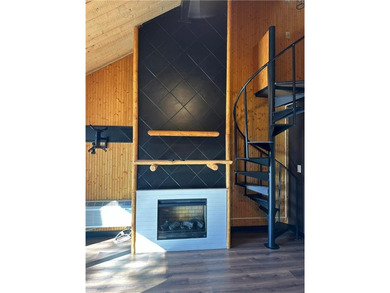 This beautifully updated 1-bedroom, 1-bath Quadna Mountain on Quadna Mountain Resort Golf Course in Minnesota - for sale on GolfHomes.com, golf home, golf lot