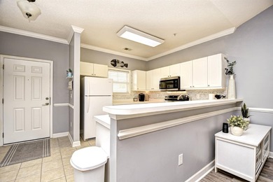 This beautiful, fully furnished top-floor 2-bedroom Willow Bend on Barefoot Resort and Golf Club  in South Carolina - for sale on GolfHomes.com, golf home, golf lot